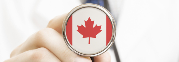 National-flag-on-stethoscope-conceptual-series-Canada-000058966732_Medium-1210x423.jpg